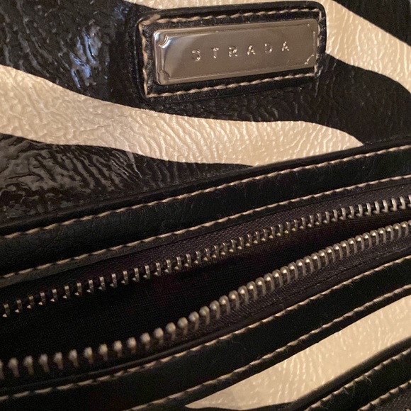 Strada handbag with black and cream zebra print. Two zippered pockets on front. - Picture 4 of 10